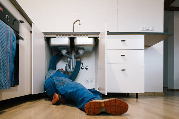 Professional Plumbing technician working in Mousie, KY